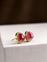 Arete de corazón Rubí con halo de diamantes en oro 14k