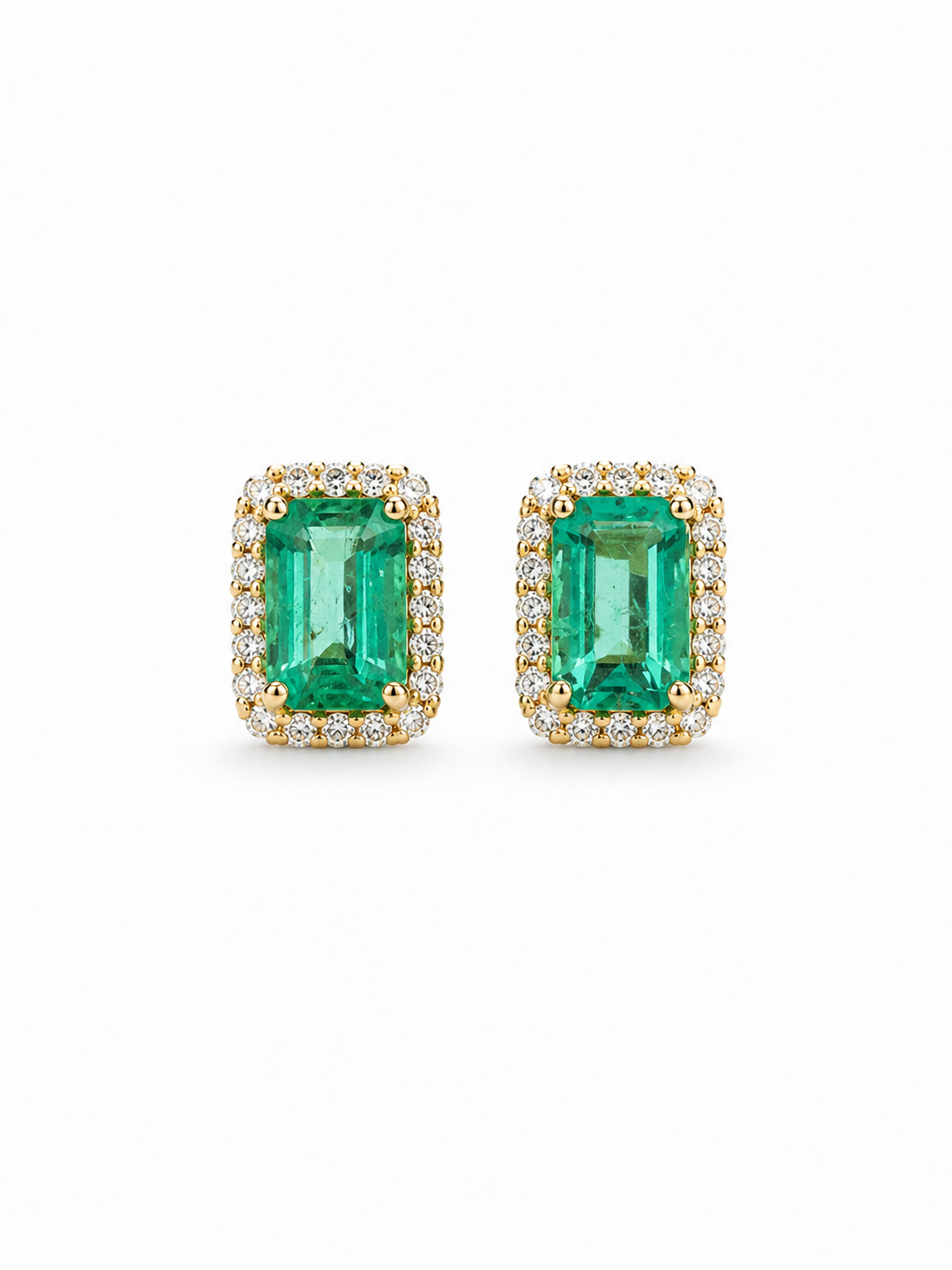 Aretes de esmeralda con halo de diamantes en oro 14k