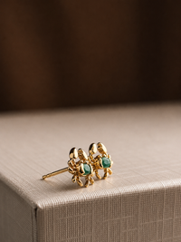 Arete cangrejo esmeralda en oro 14k