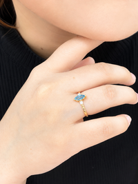 Anillo aguamarina con 2 diamantes en oro 14k