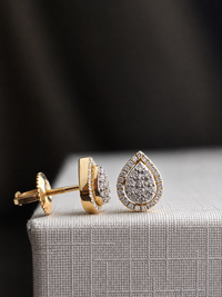 Aretes gota de diamantes naturales en oro 10k