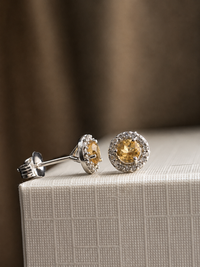 Aretes de citrino con halo de diamantes en oro 14k
