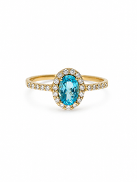Anillo oval aguamarina con halo de diamantes en oro 14k