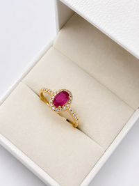 Anillo de rubi oval con halo diamantes en oro 14k