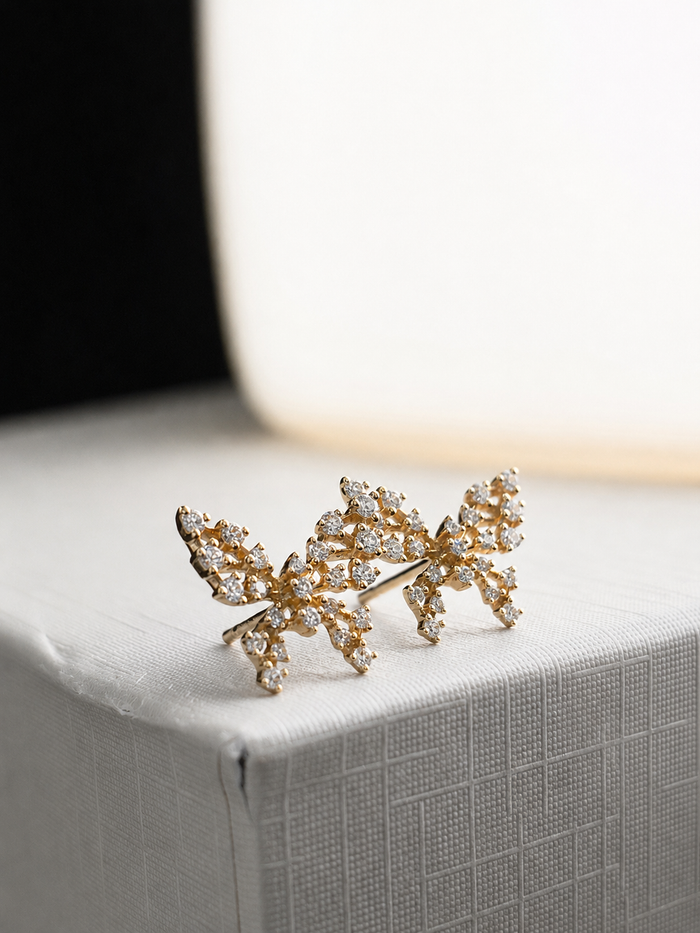 Aretes de mariposa con diamantes naturales en oro 14k