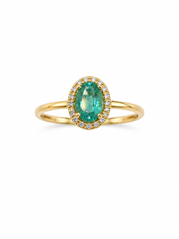 Anillo oval de esmeralda con halo de diamantes en oro 14k