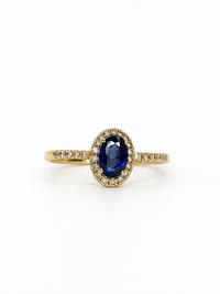 Anillo de zafiro oval con halo de diamantes en oro 14k