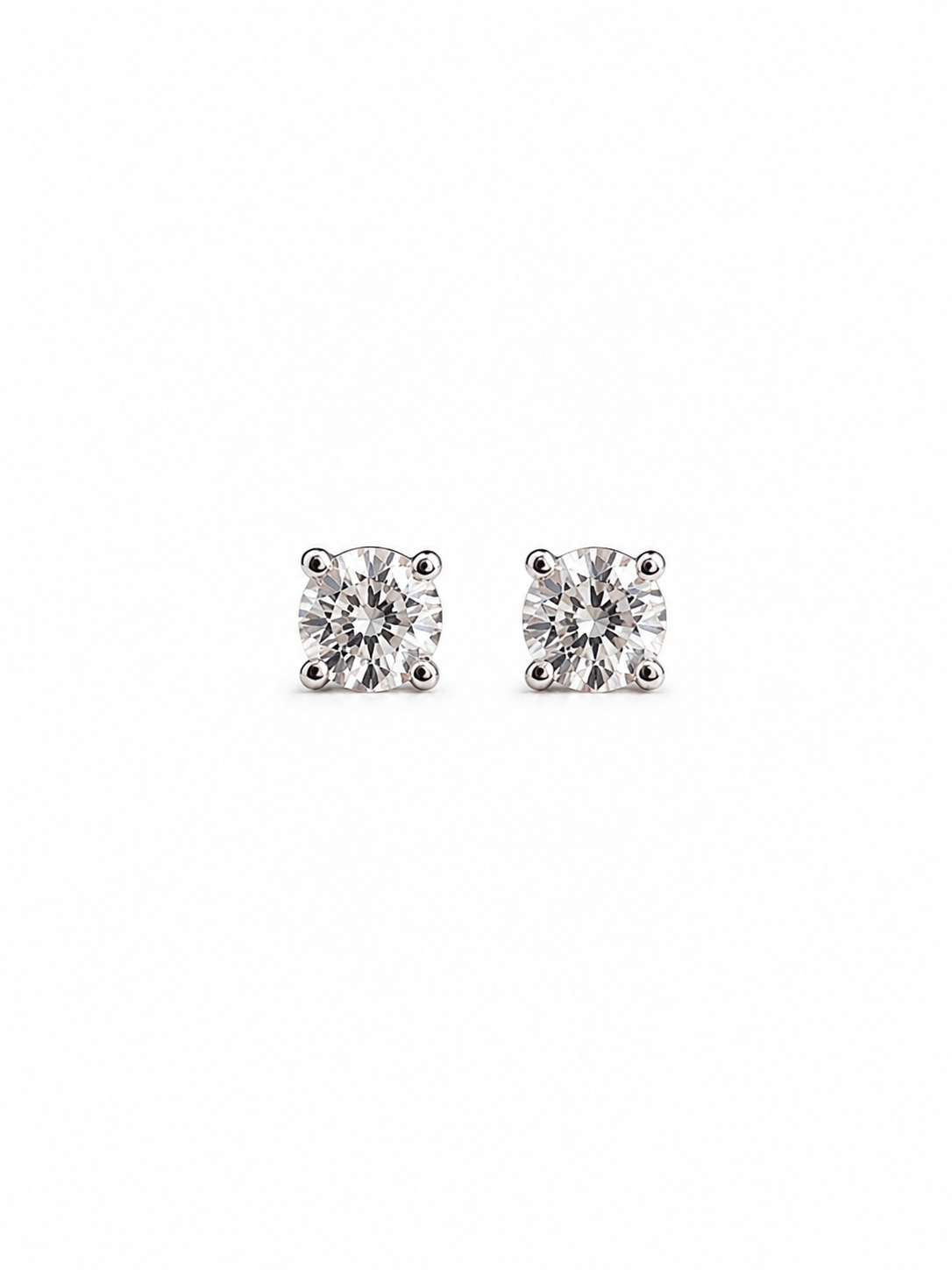 Aretes mini diamante natural en oro blanco 14k