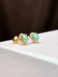 Arete de esmeralda con halo de diamantes oro 14k