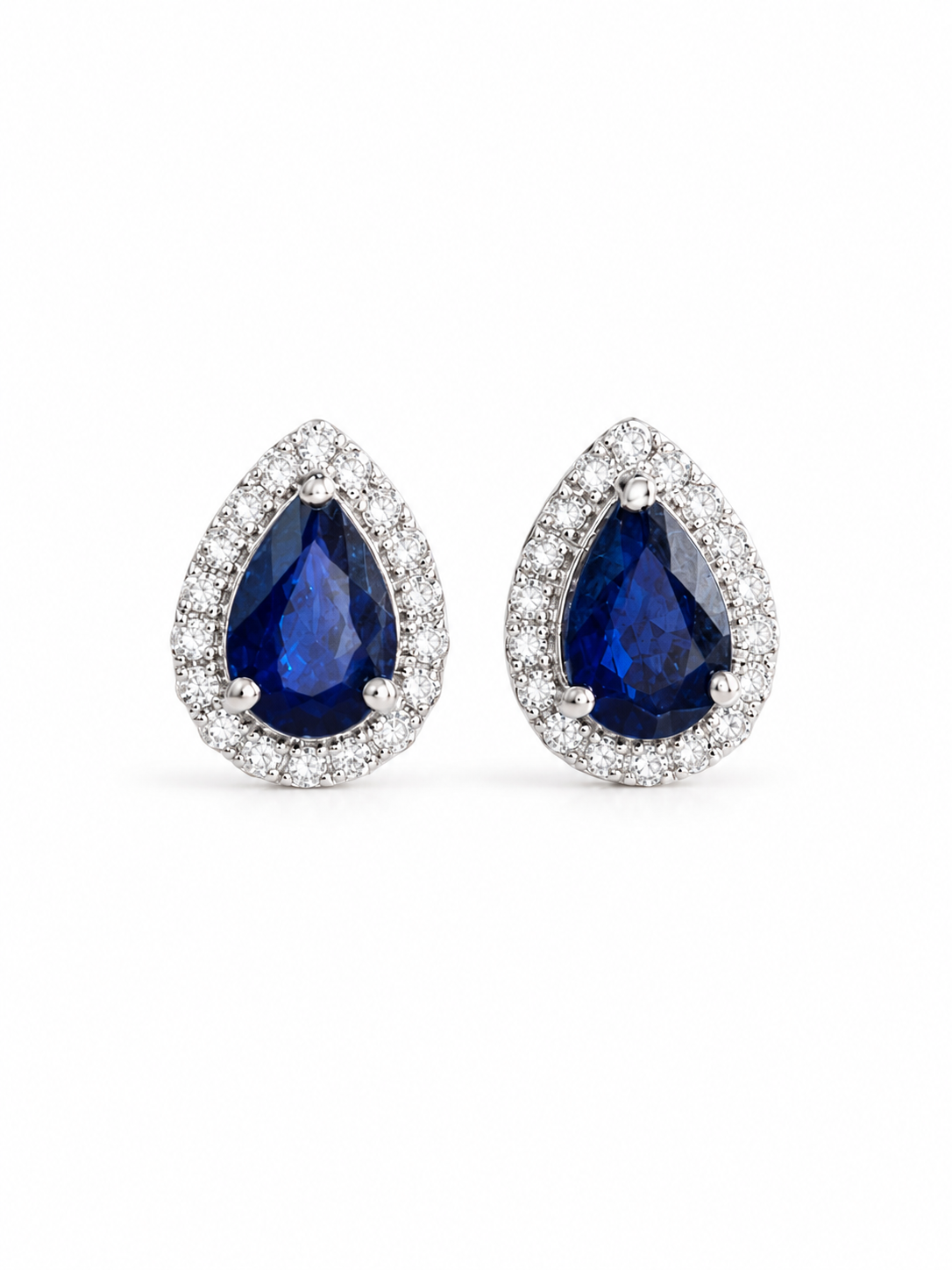 Arete gota de zafiro con halo de diamantes en oro 14k