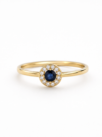 Anillo de zafiro con halo de diamantes en oro 14k
