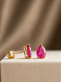 Arete gota de rubí en oro 14k
