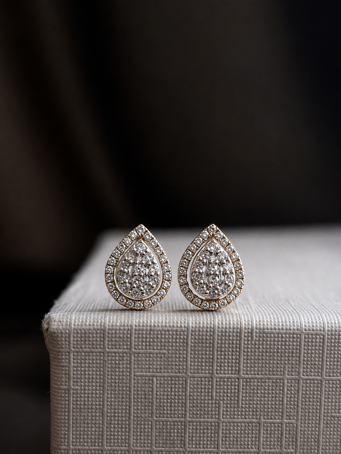 Aretes gota de diamantes naturales en oro 10k