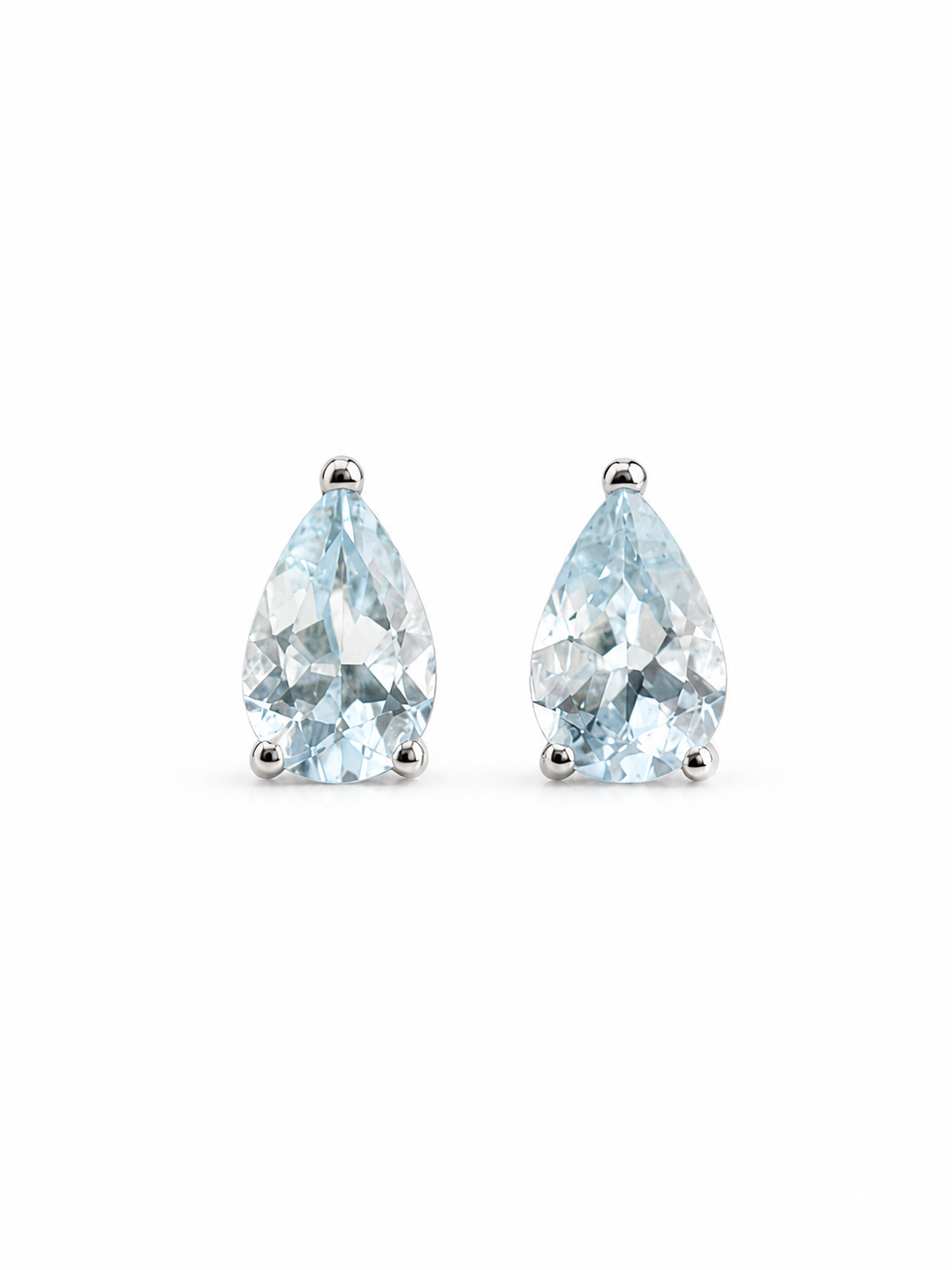 Aretes gota de aguamarina en oro blanco 14k
