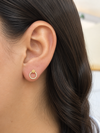 Aretes silueta diamantes naturales en oro 14k