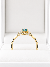 Anillo aguamarina con 2 diamantes en oro 14k