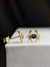 Arete cangrejo zafiro en oro 14k