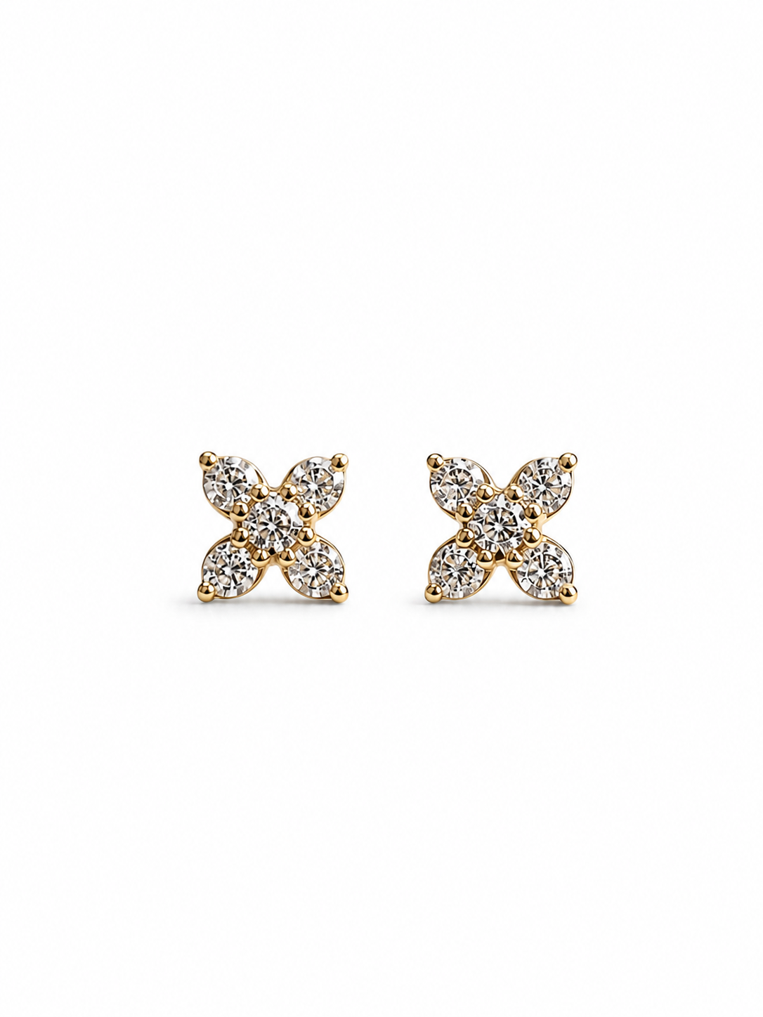Aretes mini flor diamantes naturales en oro 10k