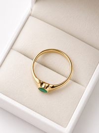 Anillo gota de esmeralda biselada en oro 14k