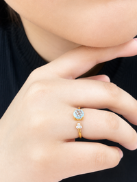Anillo aguamarina y 3 diamantes en oro 14k