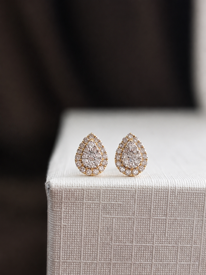 Arete gota diamantes naturales en oro 14k