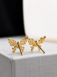 Aretes de mariposa con diamantes naturales en oro 14k