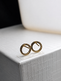 Aretes silueta de diamantes naturales en oro 14k