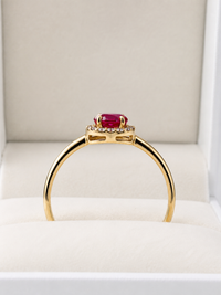 Anillo de rubi con halo de diamantes en oro 14k