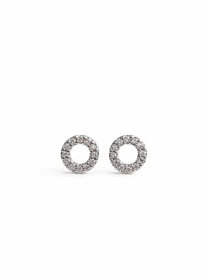 Arete silueta con diamantes naturales en oro blanco 14k