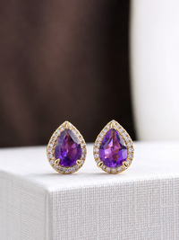 Arete de gota amatista con halo de diamantes en oro 10k
