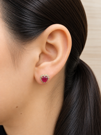 Arete de corazón Rubí con halo de diamantes en oro 14k